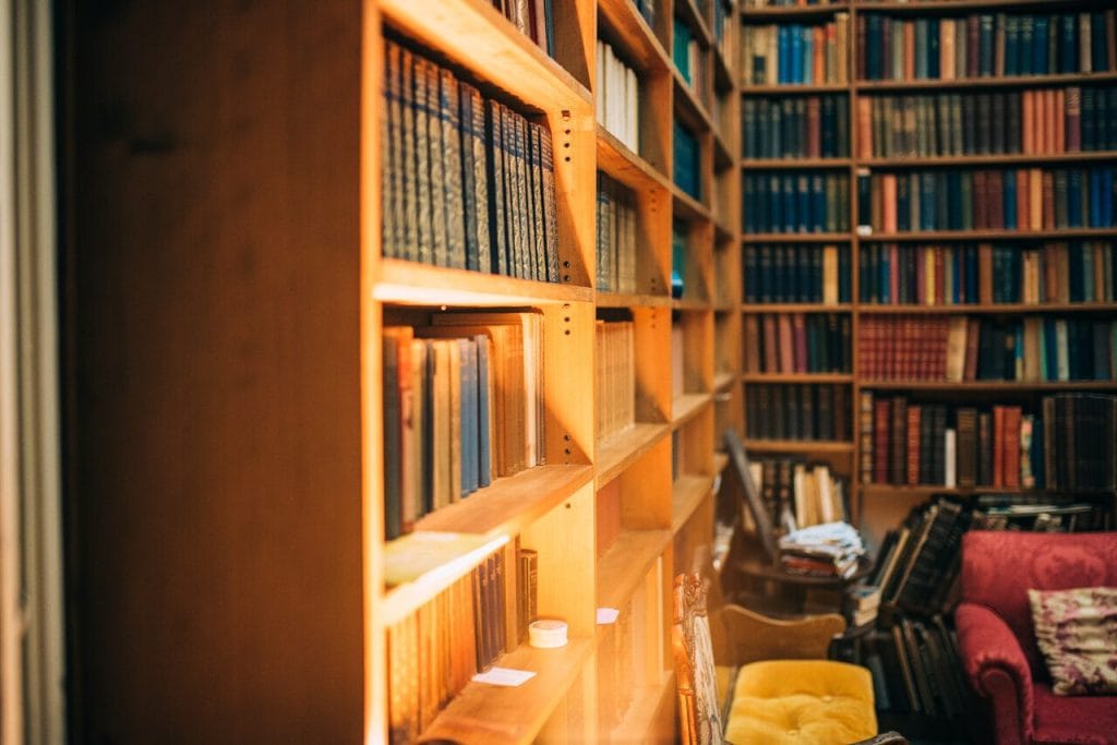 old library with a couch and chairs and old books 2024 10 18 02 22 56 utc Easy Resize.com