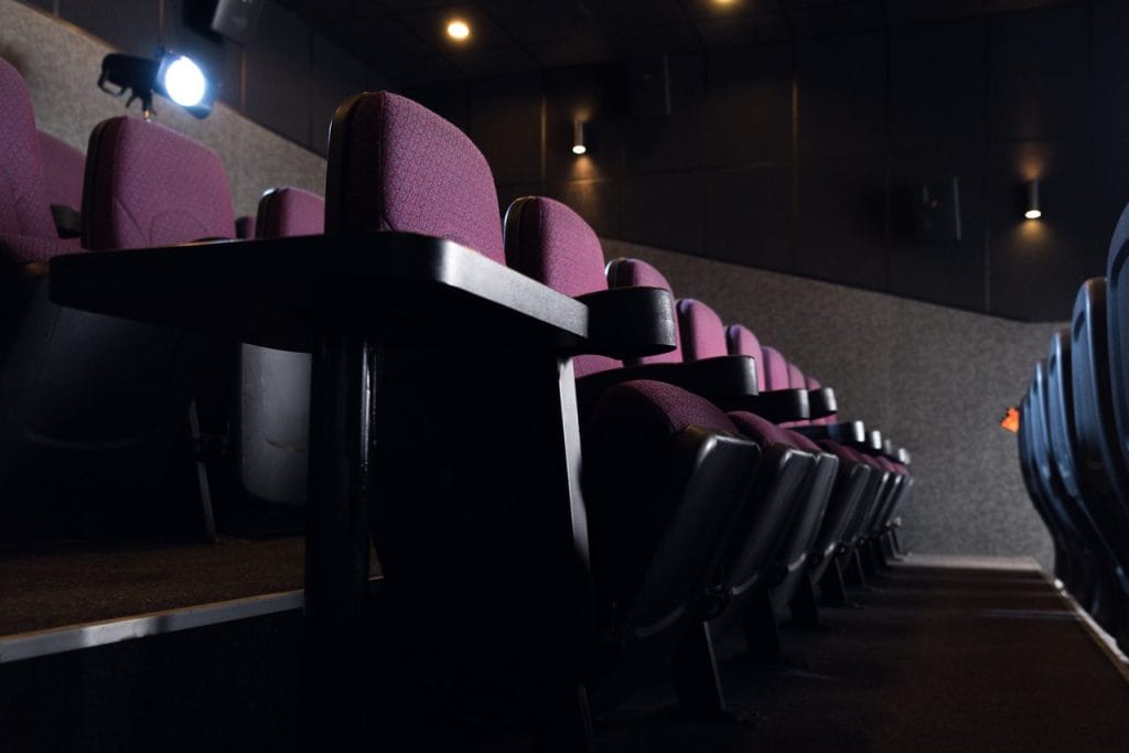 red seats in empty dark movie theater 2024 11 17 23 39 17 utc Easy Resize.com
